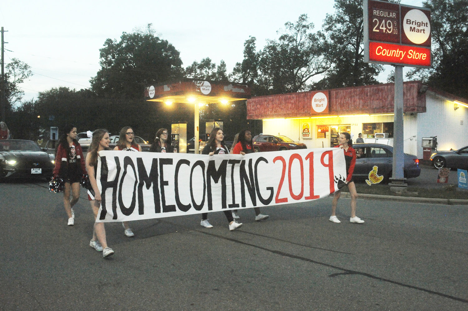 Chatham Central cheerleaders lead the Homecoming 2019 parade through downtown Goldston, Oct. 21. The parade included representatives from various grades, clubs and organizations, and the school's football and tennis teams.